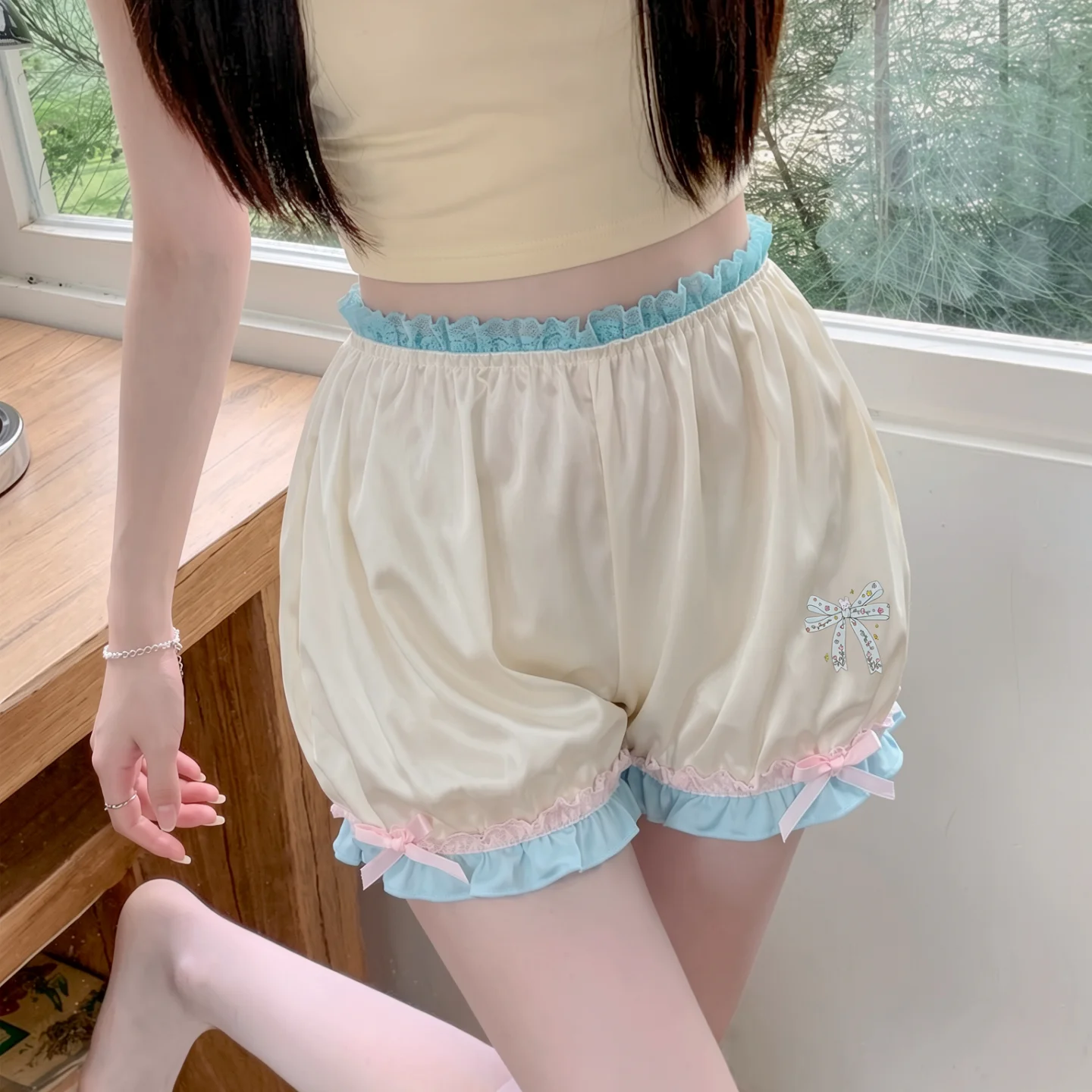 Women's Cute Ice Silk Safety Shorts Anti Se Through Bloomers 2026 Sweet Lolita New Loose Satin Ruffle Trim Under Shorts
Women's Cute Ice Silk Safety Shorts Anti Se Through Bloomers 2026 Sweet Lolita New Loose Satin Ruffle Trim Under Shorts