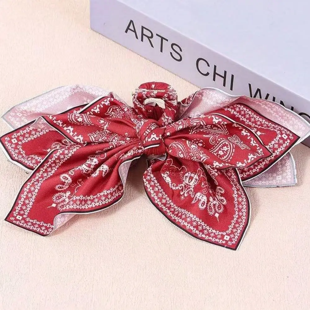 High-grade satin bow pearl back of head hair clip women's shark clip new style temperament clip grab clip
High-grade satin bow pearl back of head hair clip women's shark clip new style temperament clip grab clip