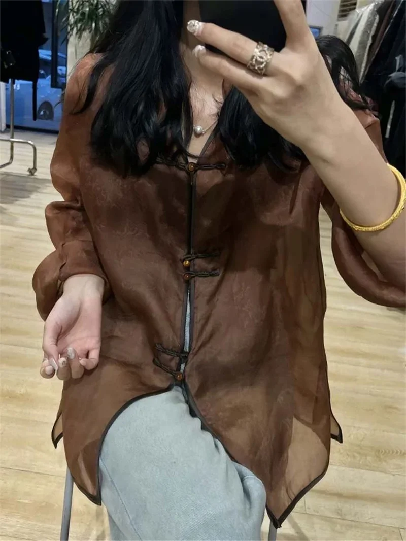 2025 New Summer Frog Button Ramie Blouse Women Korean Fashion Long Sleeve Womens Shirt Casual V Neck See Through Female Tops
2025 New Summer Frog Button Ramie Blouse Women Korean Fashion Long Sleeve Womens Shirt Casual V Neck See Through Female Tops