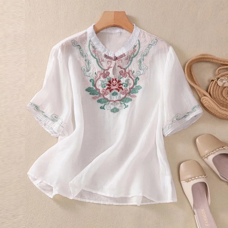 Women's Chinese Style Vintage Embroidery Blouse Stand Collar Hollow Cotton Linen Shirt Short Sleeve Loose Tops Blusas Para Mujer
Women's Chinese Style Vintage Embroidery Blouse Stand Collar Hollow Cotton Linen Shirt Short Sleeve Loose Tops Blusas Para Mujer