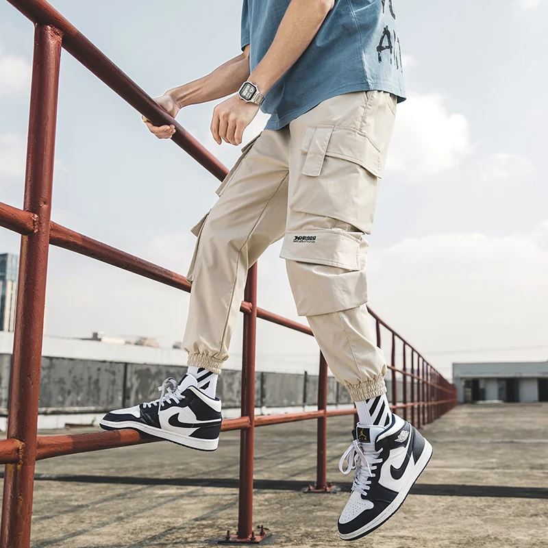 Streetwear Mens Hip Hop Jogging Pants Men Trousers Casual Loose Sweatpants Male New Multi Pocket Harem Pants Fashion 5XL
Streetwear Mens Hip Hop Jogging Pants Men Trousers Casual Loose Sweatpants Male New Multi Pocket Harem Pants Fashion 5XL