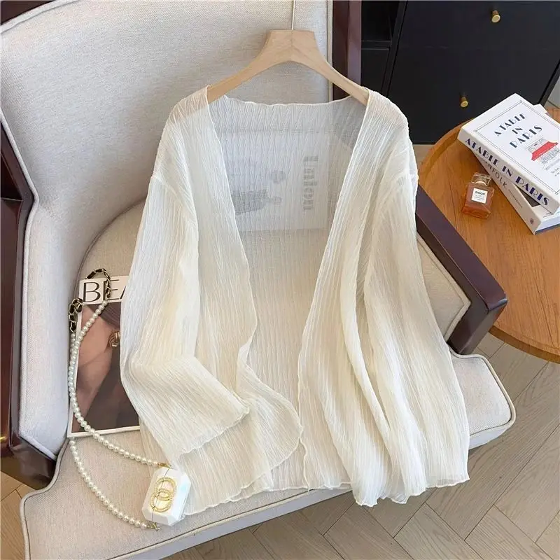 Женская модная одежда больших размеров: тонкая накидка-шаль из ледяного шелка средней длины с длинными рукавами, защитой от солнца и ажурными вставками
Женская модная одежда больших размеров: тонкая накидка-шаль из ледяного шелка средней длины с длинными рукавами, защитой от солнца и ажурными вставками