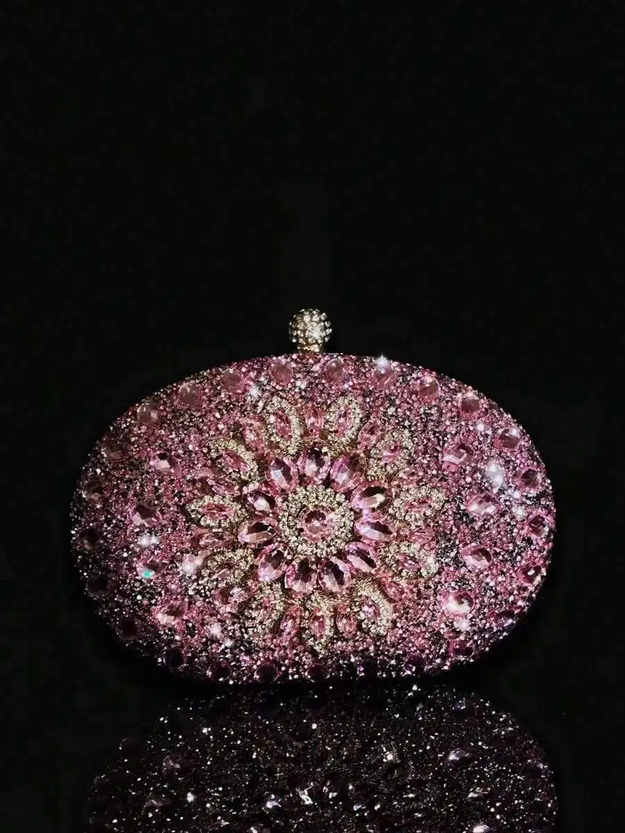 Luxurious Pink Crystal-Embellished Oval Clutch For Evening Events, Weddings, And Formal Parties
Luxurious Pink Crystal-Embellished Oval Clutch For Evening Events, Weddings, And Formal Parties