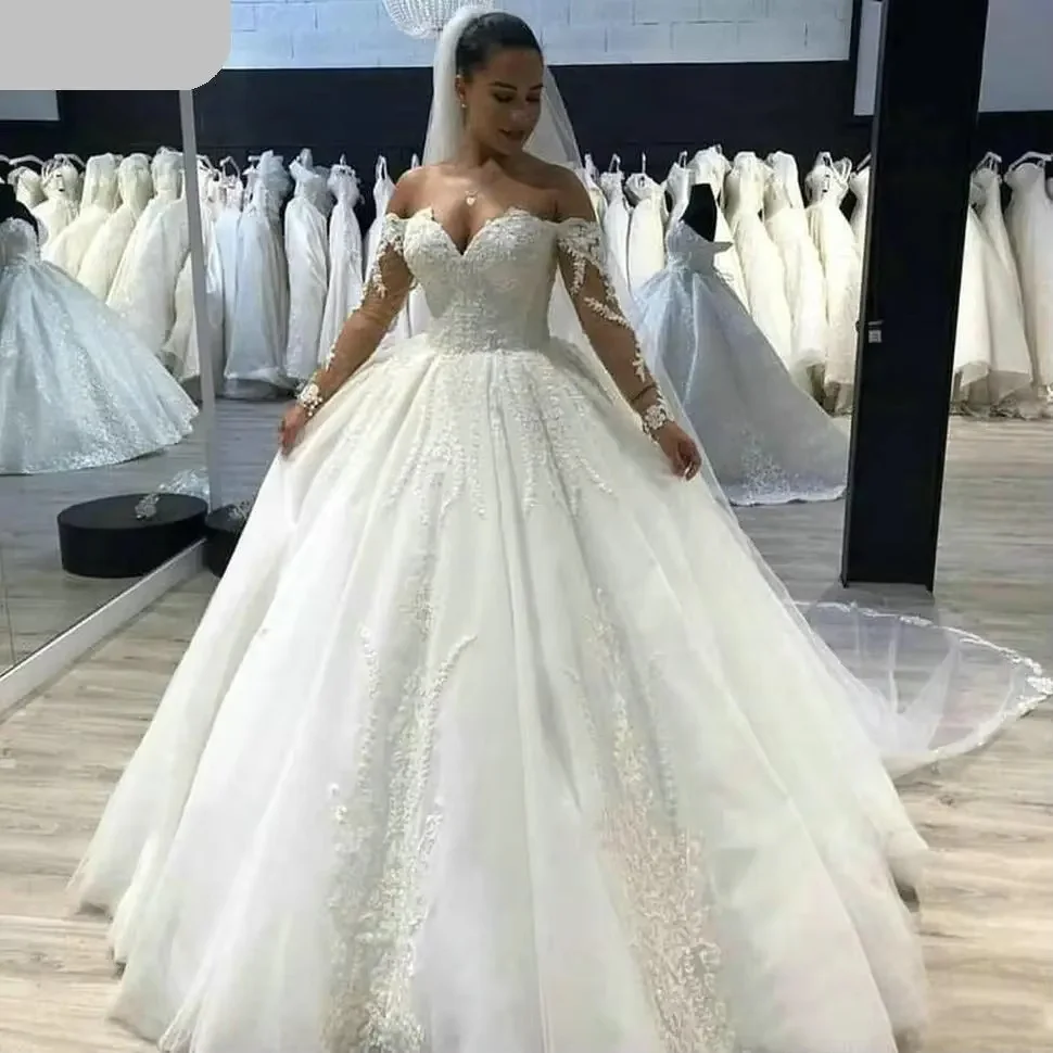 Long Sleeves Ball Gown Wedding Dress Floor Length Off Shoulder Ivory Tulle Wedding Gown Back Lace-Up Customized
Long Sleeves Ball Gown Wedding Dress Floor Length Off Shoulder Ivory Tulle Wedding Gown Back Lace-Up Customized