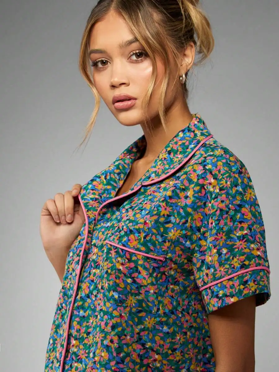 Floral Print Short Sleeve Pajama Set With Pink Piping Button Down Top Shorts Summer Loungewear
Floral Print Short Sleeve Pajama Set With Pink Piping Button Down Top Shorts Summer Loungewear