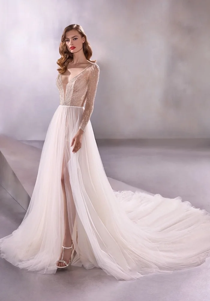 Customized New Elegant And Shiny A-Line Lace Embroidery Women's Wedding Dress Sexy Deep V-Neck Side Slit Beach Dance Bridal Gown
Customized New Elegant And Shiny A-Line Lace Embroidery Women's Wedding Dress Sexy Deep V-Neck Side Slit Beach Dance Bridal Gown