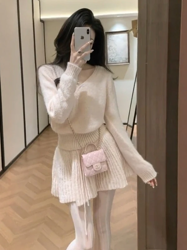 Korean Style Sweet Pink V-Neck Knitted Sweater And Skirt Two-Piece Set for Women Warm Casual Fashion Spring New Arrival
Korean Style Sweet Pink V-Neck Knitted Sweater And Skirt Two-Piece Set for Women Warm Casual Fashion Spring New Arrival