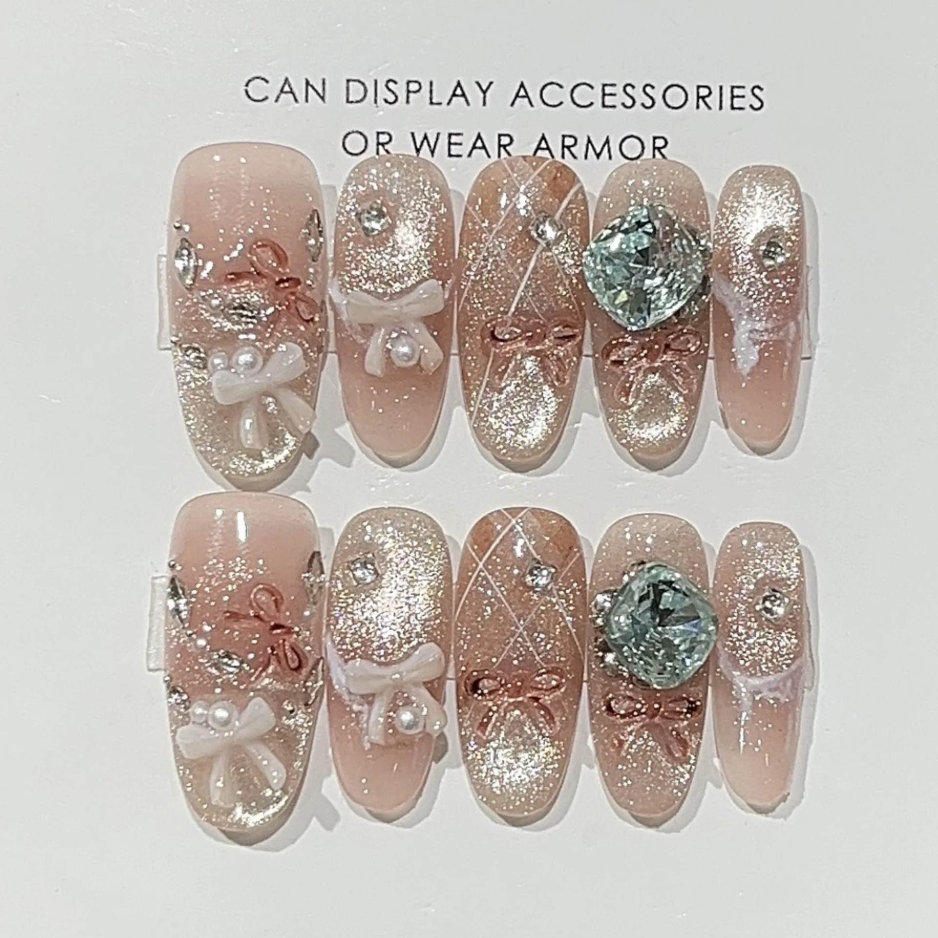 10pcs Glitter Cat's Eye Fake Nails Art French Tips Oval Handmade Press on Nails Sets with Diamond Bow Design Stick on False Nail
10pcs Glitter Cat's Eye Fake Nails Art French Tips Oval Handmade Press on Nails Sets with Diamond Bow Design Stick on False Nail