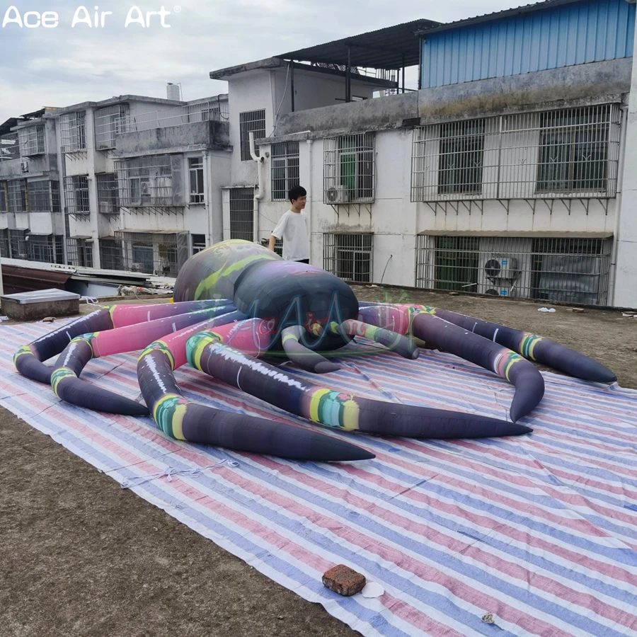 Halloween Courtyard Decorated with Huge Colorful Inflatable Spider with Blower and Lights, Terrifying Background
Halloween Courtyard Decorated with Huge Colorful Inflatable Spider with Blower and Lights, Terrifying Background