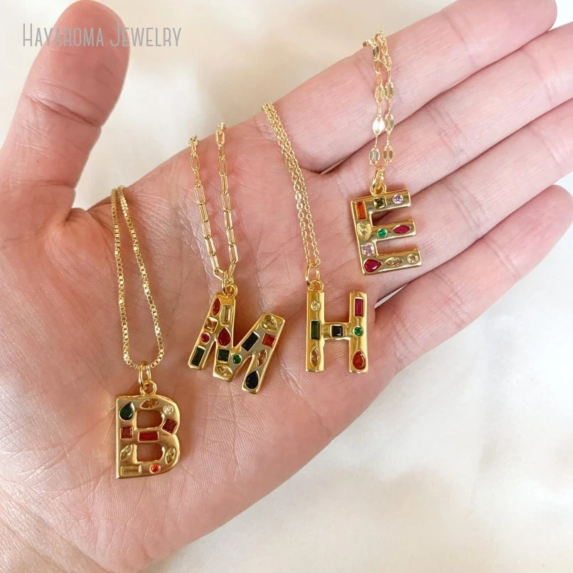 10 шт. ожерелье с буквами золотого цвета Радуга CZ драгоценный камень кулон женские ювелирные изделия
10 шт. ожерелье с буквами золотого цвета Радуга CZ драгоценный камень кулон женские ювелирные изделия