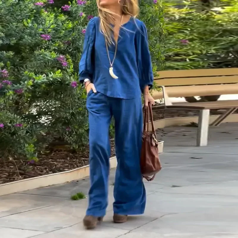 Повседневная свободная однотонная хлопково-льняная женская одежда Осенний топ с рукавами три четверти и длинные брюки Комплект в стиле бохо с V-образным вырезом и широкими брюками
Повседневная свободная однотонная хлопково-льняная женская одежда Осенний топ с рукавами три четверти и длинные брюки Комплект в стиле бохо с V-образным вырезом и широкими брюками