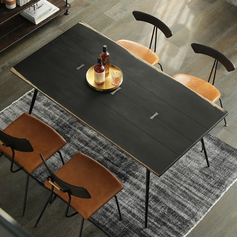 Wrought iron natural edge expression retro industrial style designer American black dining table
Wrought iron natural edge expression retro industrial style designer American black dining table