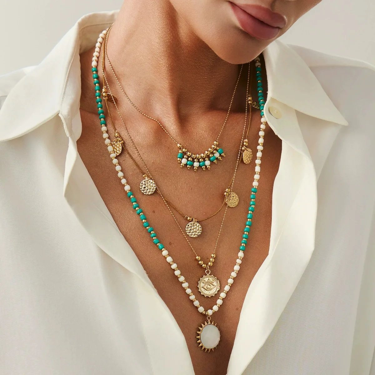 European and American jewelry bohemian rice beads beaded clavicle necklace ins metal pitted round pendant necklace
European and American jewelry bohemian rice beads beaded clavicle necklace ins metal pitted round pendant necklace