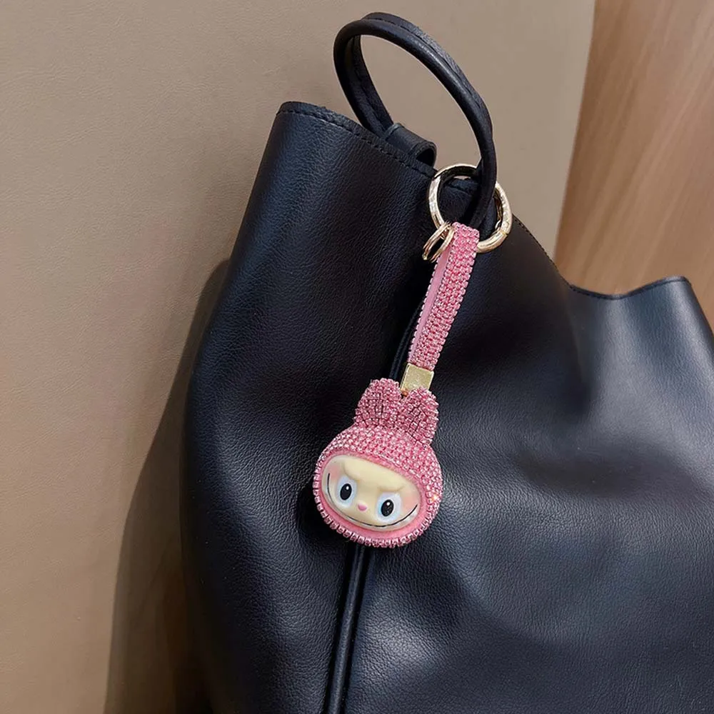 Internet celebrity shining LABUBU doll key chain cartoon Q version full diamond doll car key chain backpack small pendant
Internet celebrity shining LABUBU doll key chain cartoon Q version full diamond doll car key chain backpack small pendant