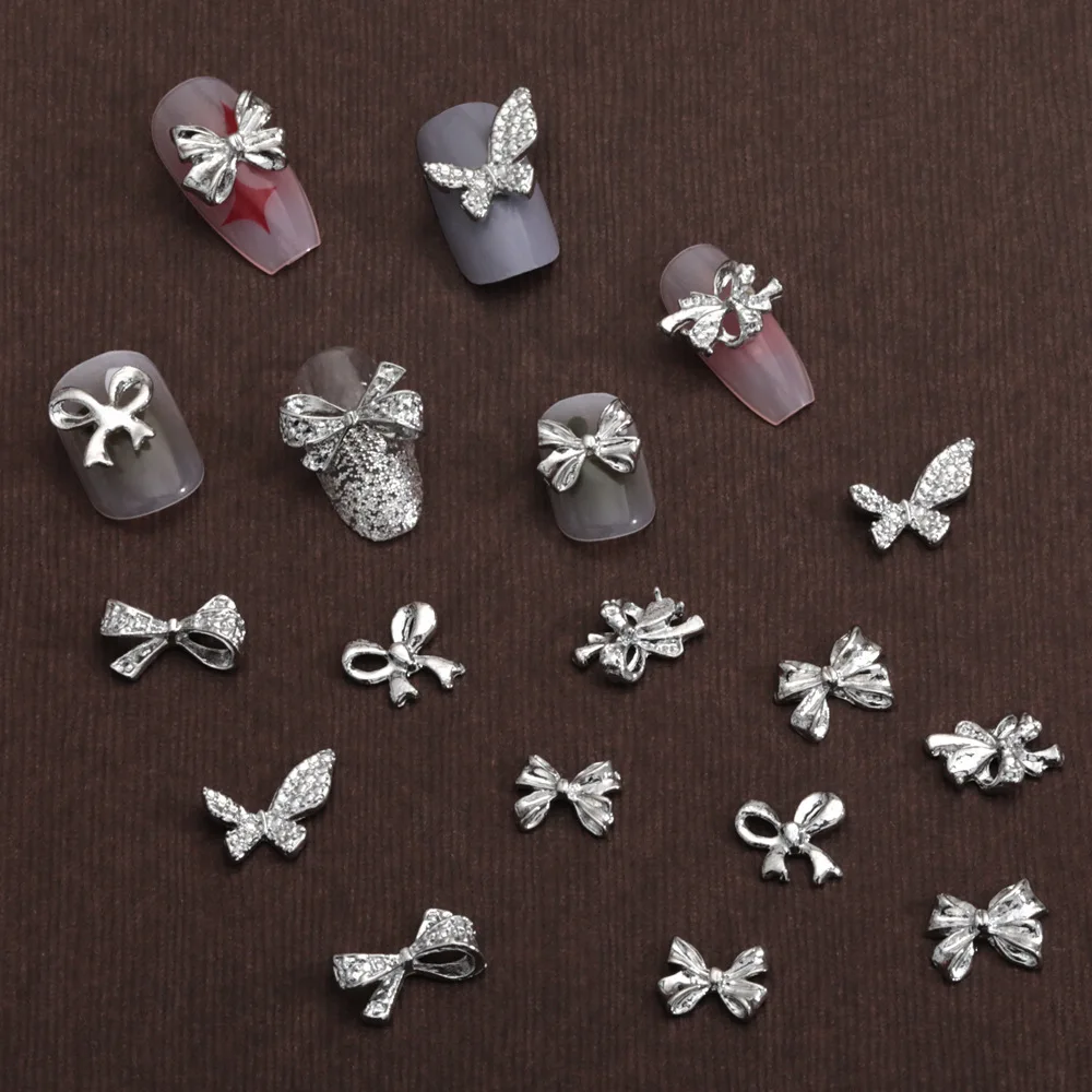 20PCS Silver Metal 3D Nail Art Bow Tie Charms Accessories Alloy Bowknot Parts For Manicure Decor Nails Decoration Supplies Tool 
20PCS Silver Metal 3D Nail Art Bow Tie Charms Accessories Alloy Bowknot Parts For Manicure Decor Nails Decoration Supplies Tool