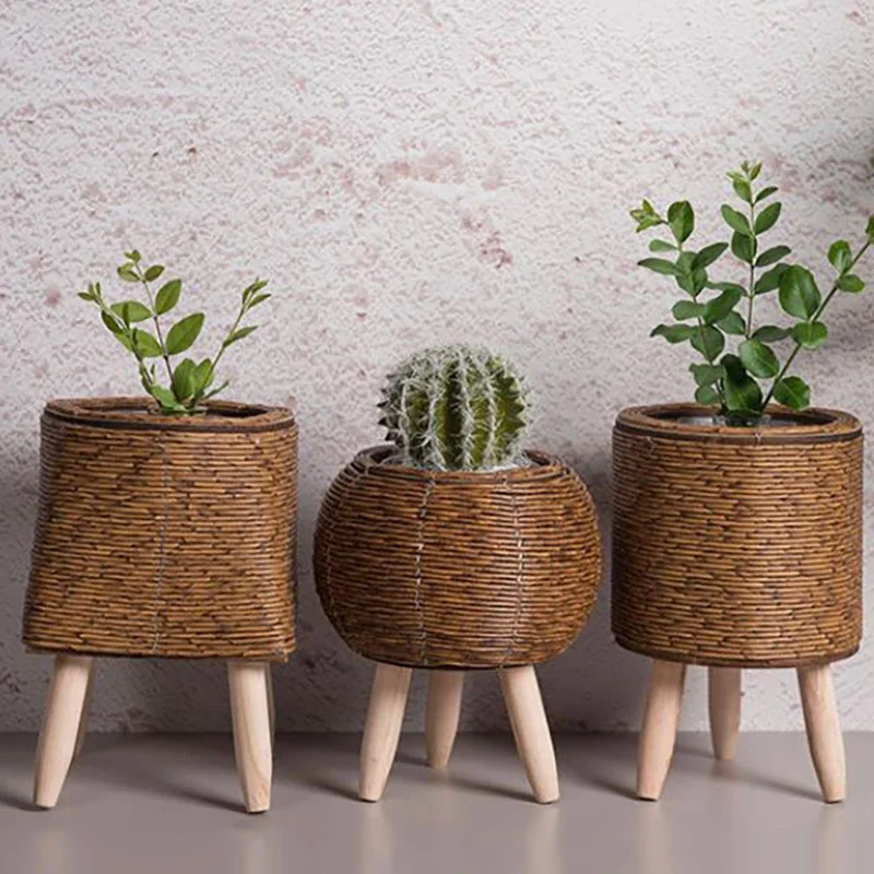 Flower Pot Rustic Rattan Planter with Wooden Legs Versatile Hand Woven Storage Basket for Indoor Outdoor Flower Plants Decor New
Flower Pot Rustic Rattan Planter with Wooden Legs Versatile Hand Woven Storage Basket for Indoor Outdoor Flower Plants Decor New