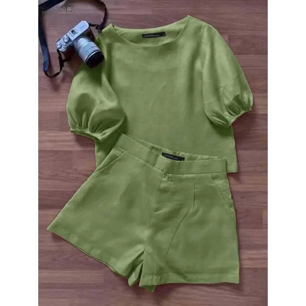 Винтажный летний костюм-двойка ZANZEA: блузка и шорты с низкой талией из хлопка, цельный комплект для женщин, коллекция Весна 2026
Винтажный летний костюм-двойка ZANZEA: блузка и шорты с низкой талией из хлопка, цельный комплект для женщин, коллекция Весна 2026