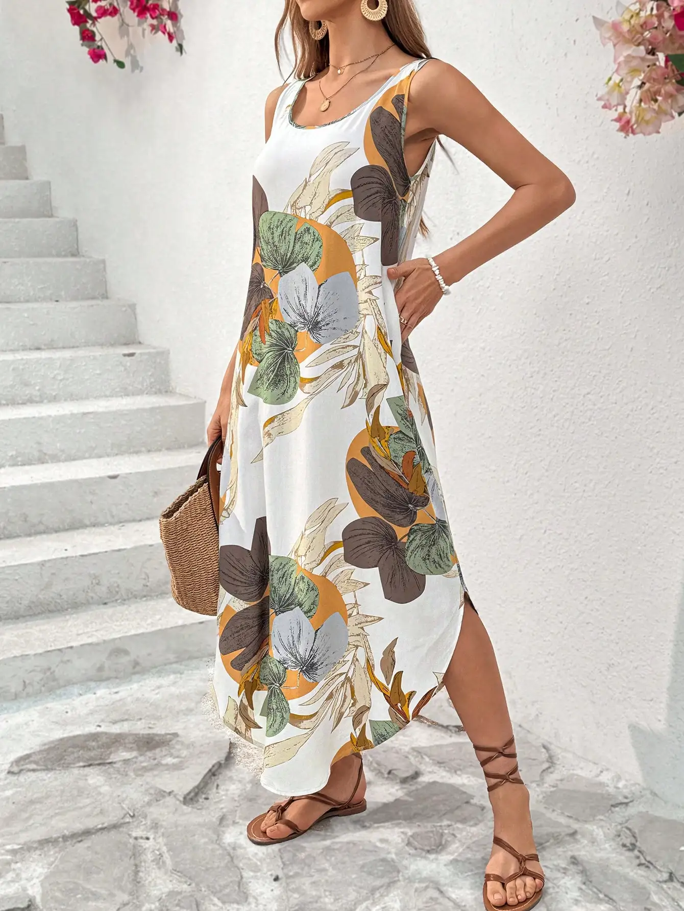 Женское летнее платье макси без рукавов с принтом тропических листьев
Женское летнее платье макси без рукавов с принтом тропических листьев