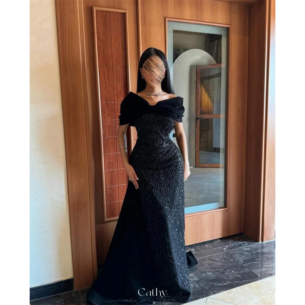 Cathy Dubai Черное платье для выпускного вечера с открытыми плечами и бантом Русалка Vestidos de Noiva Элегантное вечернее платье на заказ
Cathy Dubai Черное платье для выпускного вечера с открытыми плечами и бантом Русалка Vestidos de Noiva Элегантное вечернее платье на заказ