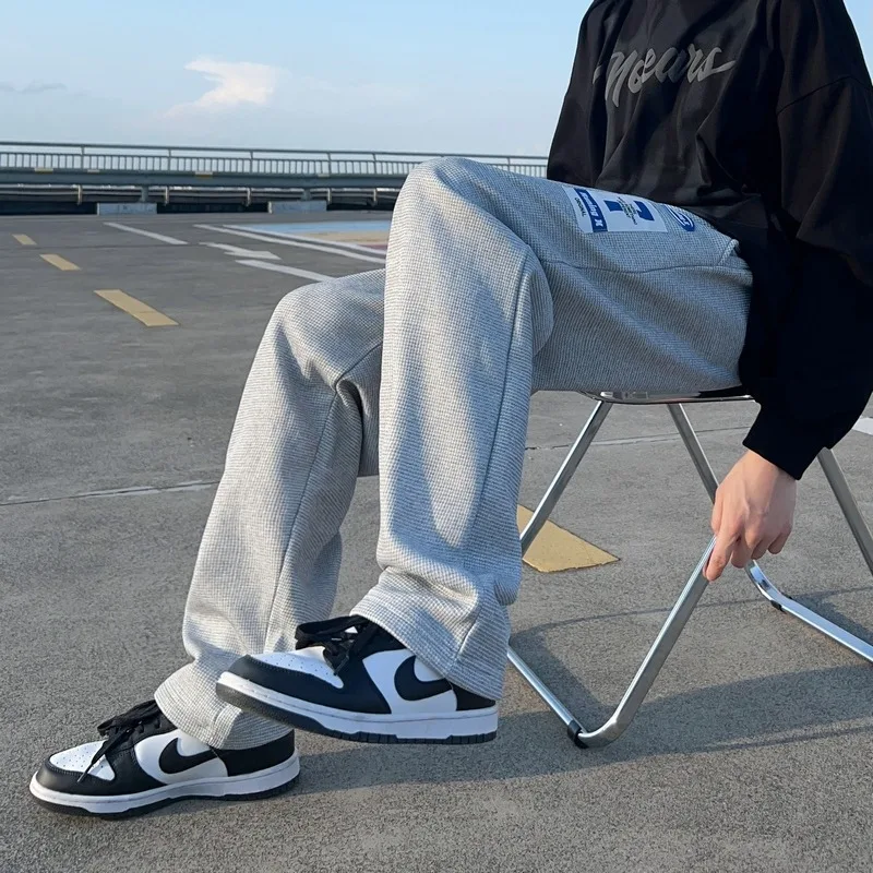 2025 Korean men's spring and autumn fashion brand sports loose bundle foot color casual pants streetwear men joggers men pants
2025 Korean men's spring and autumn fashion brand sports loose bundle foot color casual pants streetwear men joggers men pants
