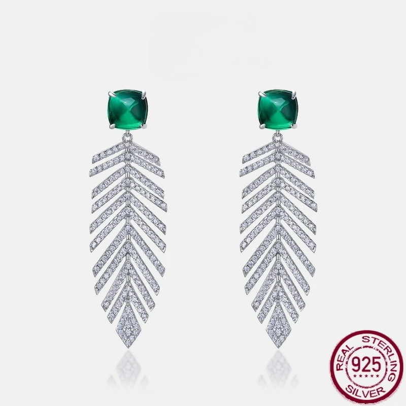 New S925 pure silver colored gemstone tassel inlaid with synthetic green gemstone earrings, retro light luxury wedding jewelry
New S925 pure silver colored gemstone tassel inlaid with synthetic green gemstone earrings, retro light luxury wedding jewelry