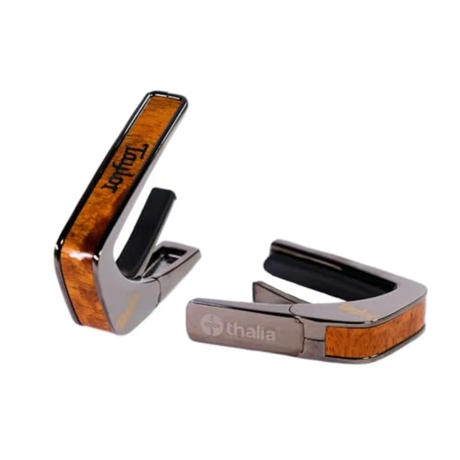 Guitar capo for live performance, chrome-finished metal, black, lightweight and quick-release mechanism
Guitar capo for live performance, chrome-finished metal, black, lightweight and quick-release mechanism