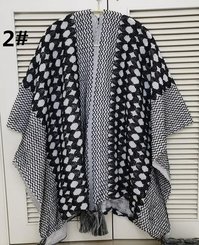 Poncho Cloak Knitted Cape Tassel Women Autumn and Winter Leisure Ethnic Tourism and Shopping Coat Lady Warm Cardigan Black
Poncho Cloak Knitted Cape Tassel Women Autumn and Winter Leisure Ethnic Tourism and Shopping Coat Lady Warm Cardigan Black