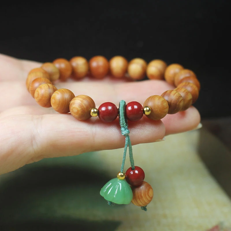 Bamboo wood high-oil content 8mm bracelet with emerald green lotus pod pendant, antique style unisex prayer beads
Bamboo wood high-oil content 8mm bracelet with emerald green lotus pod pendant, antique style unisex prayer beads