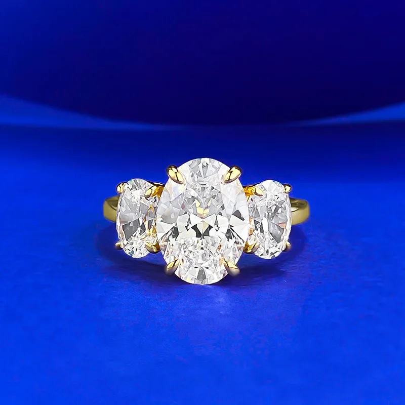 Женское кольцо с тремя высокоуглеродистыми бриллиантами, обручальное кольцо из стерлингового серебра 925 пробы и обручальное кольцо, позолоченные ювелирные изделия
Женское кольцо с тремя высокоуглеродистыми бриллиантами, обручальное кольцо из стерлингового серебра 925 пробы и обручальное кольцо, позолоченные ювелирные изделия