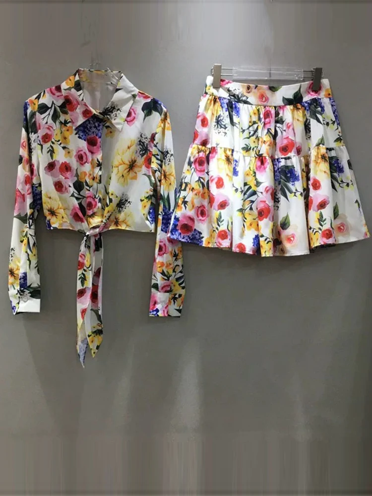 Temperament printing short shirt jacket spring and summer new two-piece suit+high waist and big swing mini skirt women's suit
Temperament printing short shirt jacket spring and summer new two-piece suit+high waist and big swing mini skirt women's suit