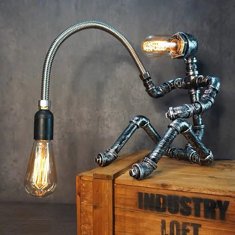 Vintage desk lamp loft creative industrial style punk decoration coffee bar wrought iron robot ornament desktop lamp
Vintage desk lamp loft creative industrial style punk decoration coffee bar wrought iron robot ornament desktop lamp