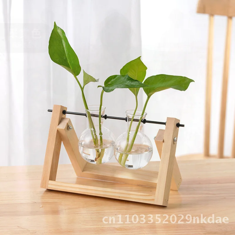 Creative Wooden Frame Hydroponic Vase Handmade Glass Container for Office Desktop Green Plant Swing Rose Bottle Ornament
Creative Wooden Frame Hydroponic Vase Handmade Glass Container for Office Desktop Green Plant Swing Rose Bottle Ornament