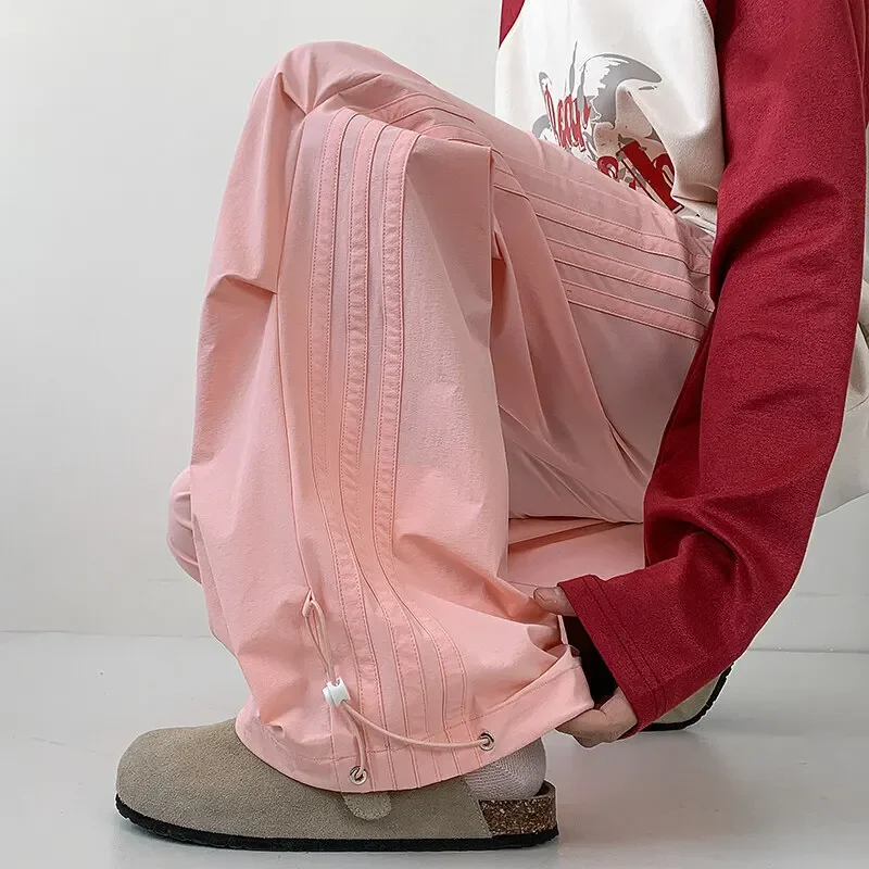 Pop Summer Black Casual Pants Men Oversized Wide Leg Pants Men Streetwear Hip-hop Loose Pink Sports Pants Mens Joggers Trousers
Pop Summer Black Casual Pants Men Oversized Wide Leg Pants Men Streetwear Hip-hop Loose Pink Sports Pants Mens Joggers Trousers