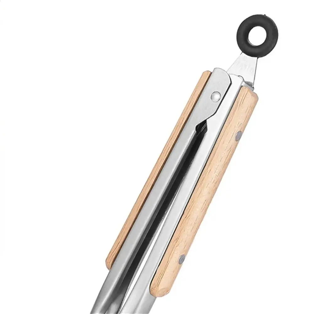 1Pcs Stainless Steel Grill Tong Wooden Handle Kitchen Accessories Bread Salad Serving Clip Anti-Scalding 7/9/12/14/16 Inch
1Pcs Stainless Steel Grill Tong Wooden Handle Kitchen Accessories Bread Salad Serving Clip Anti-Scalding 7/9/12/14/16 Inch