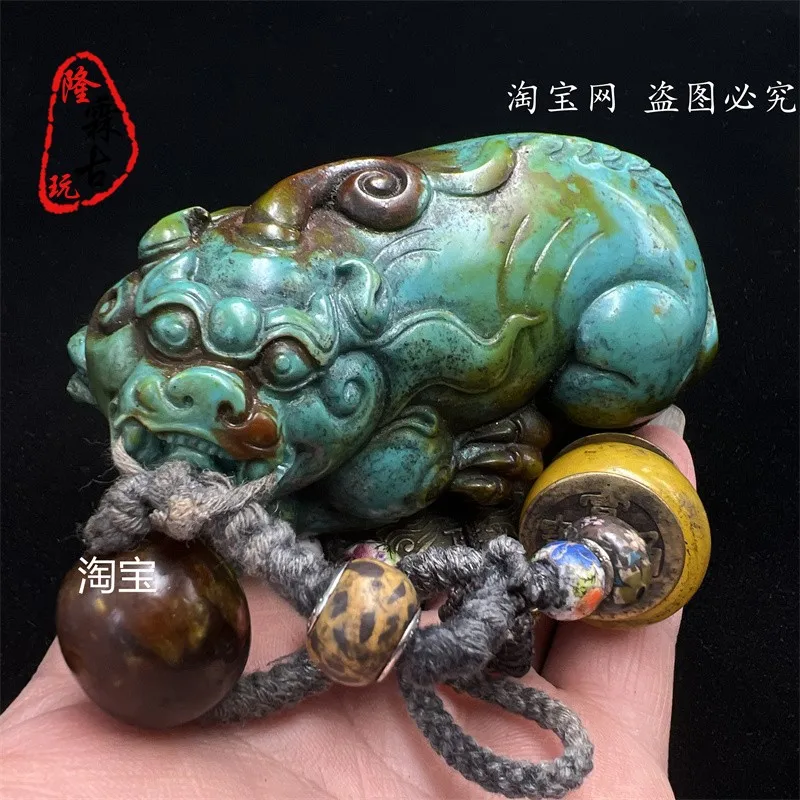 Pulp-coated turquoise Pixiu hand handle ornament Tibetan silver accessories pendant Gaoguyu old object
Pulp-coated turquoise Pixiu hand handle ornament Tibetan silver accessories pendant Gaoguyu old object