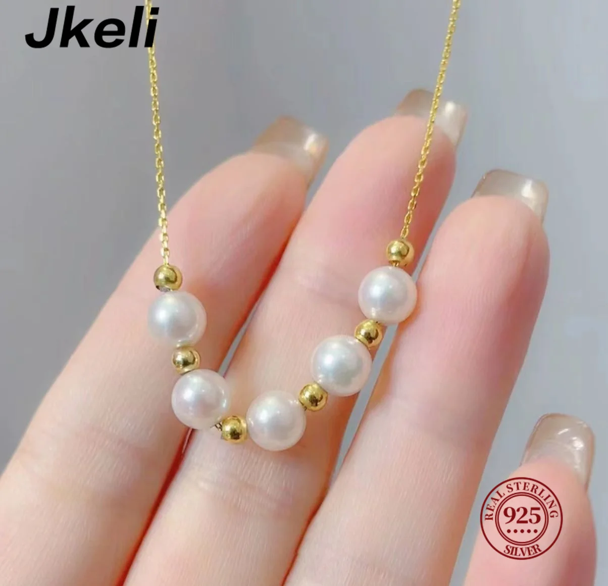 Jkeli S925 Sterling Silver Smiling Pearl Necklace for Women Unique Design Versatile Lockbone Chain Jewelry Accessory
Jkeli S925 Sterling Silver Smiling Pearl Necklace for Women Unique Design Versatile Lockbone Chain Jewelry Accessory