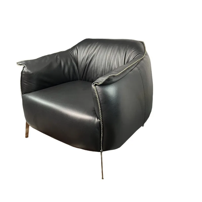 Full leather casual sofa chair, classic chair in hotel living room
Full leather casual sofa chair, classic chair in hotel living room
