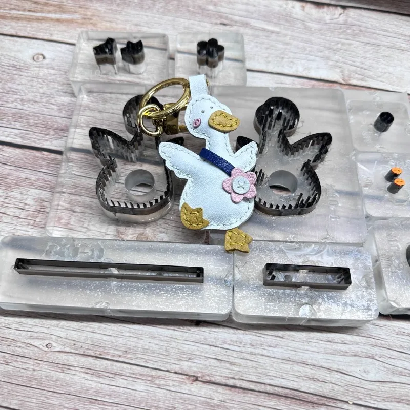 Oil duck keychain hanging ornament cutting mold, duck hanging piece ornament cutting mold, laser cutting mold customization
Oil duck keychain hanging ornament cutting mold, duck hanging piece ornament cutting mold, laser cutting mold customization