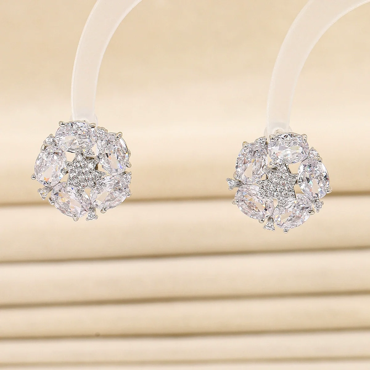 Silver Tone Star Center Stud Earrings with Large Clear Gemstone Halo and Sparkling Rhinestone Accents for Women
Silver Tone Star Center Stud Earrings with Large Clear Gemstone Halo and Sparkling Rhinestone Accents for Women