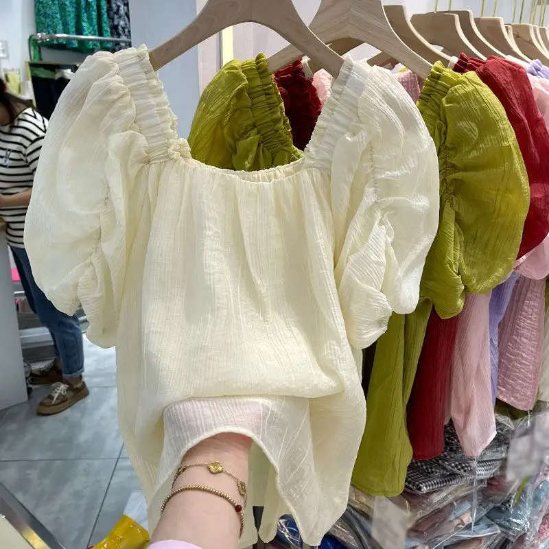 French style square neck bubble sleeve shirt summer casual loose elegant ruffle edge short sleeve tops Fashion Clothes for women
French style square neck bubble sleeve shirt summer casual loose elegant ruffle edge short sleeve tops Fashion Clothes for women
