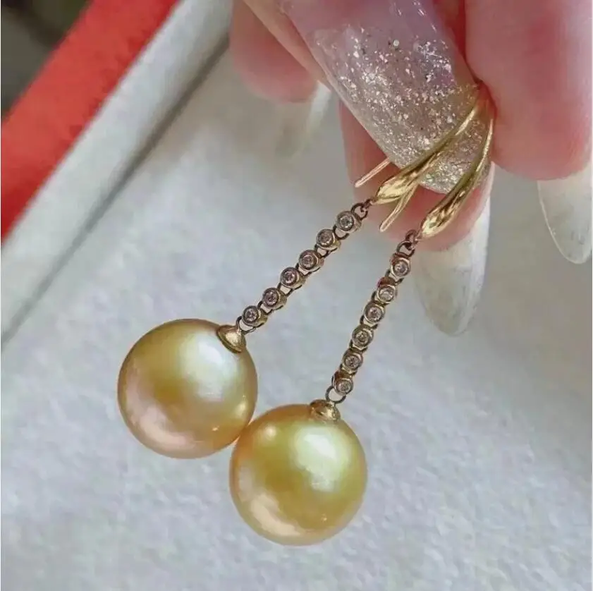 Stunning new Round 11-12mm 10-11mm natural South Sea Golden pearl dangle earring 925s
Stunning new Round 11-12mm 10-11mm natural South Sea Golden pearl dangle earring 925s