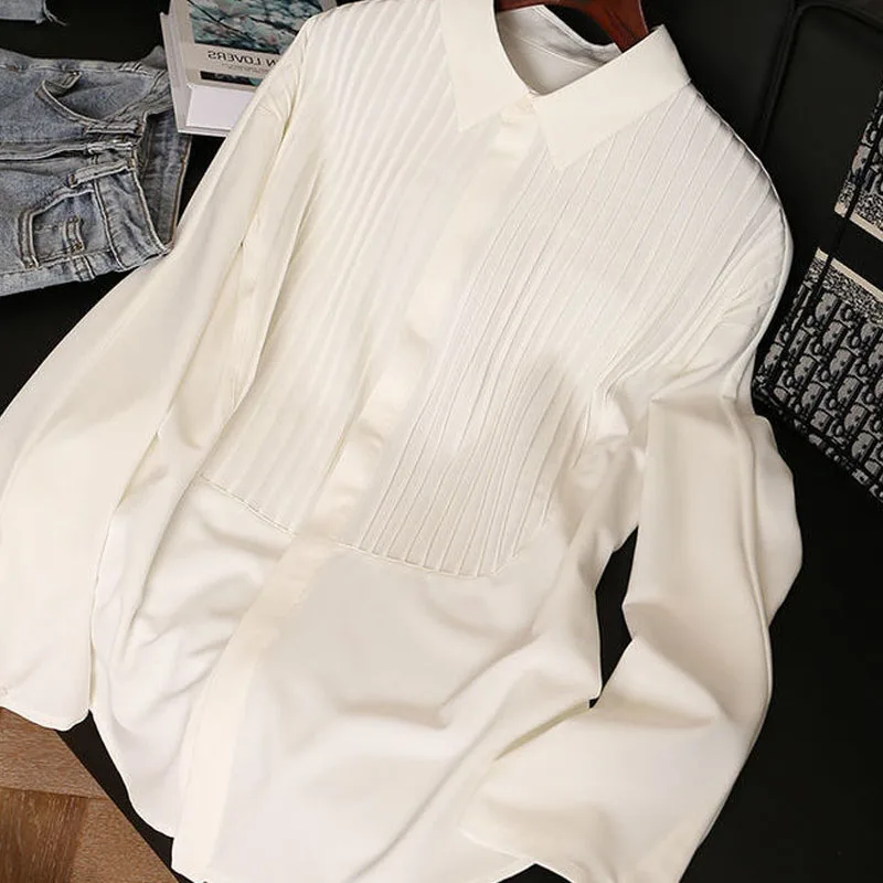 Женская повседневная свободная шифоновая рубашка, модная плиссированная лоскутная рубашка с воротником-поло, женская одежда, новые весенние белые универсальные топы 2025 
Женская повседневная свободная шифоновая рубашка, модная плиссированная лоскутная рубашка с воротником-поло, женская одежда, новые весенние белые универсальные топы 2025