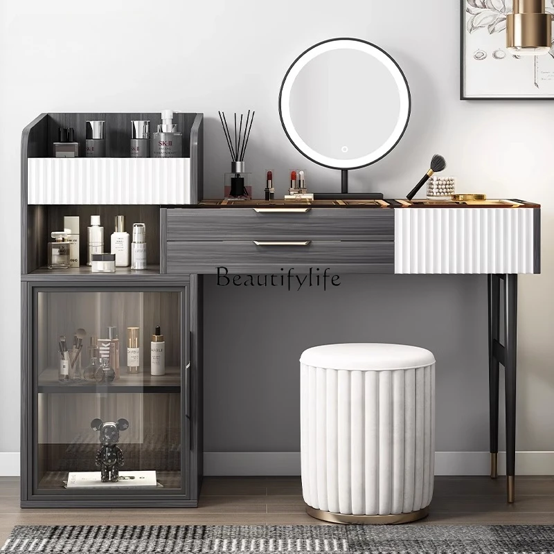 Dresser glass light luxury modern simple rock slab makeup table storage cabinet integrated table
Dresser glass light luxury modern simple rock slab makeup table storage cabinet integrated table