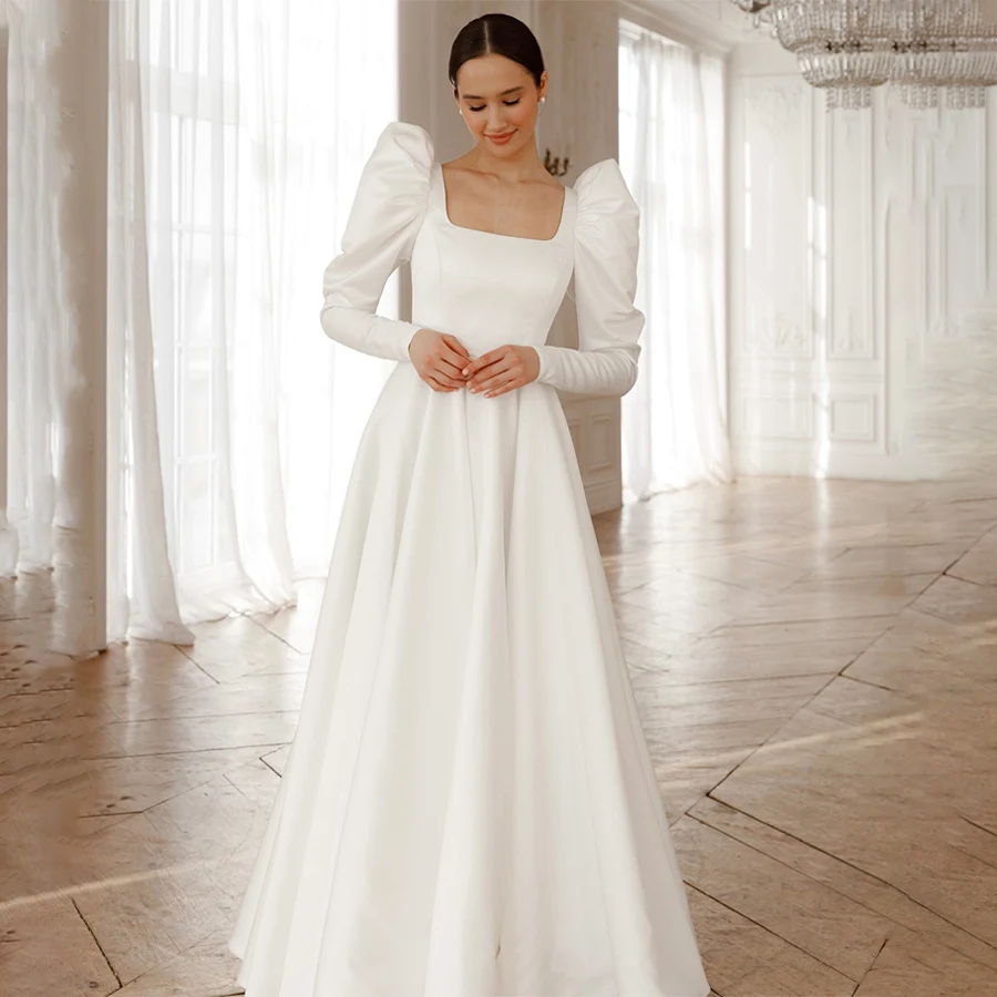 Customized Simple Satin Wedding Dress Square Collar Long Sleeve Backless Lace Up Floor Length Bridal Gown robe de mariée
Customized Simple Satin Wedding Dress Square Collar Long Sleeve Backless Lace Up Floor Length Bridal Gown robe de mariée