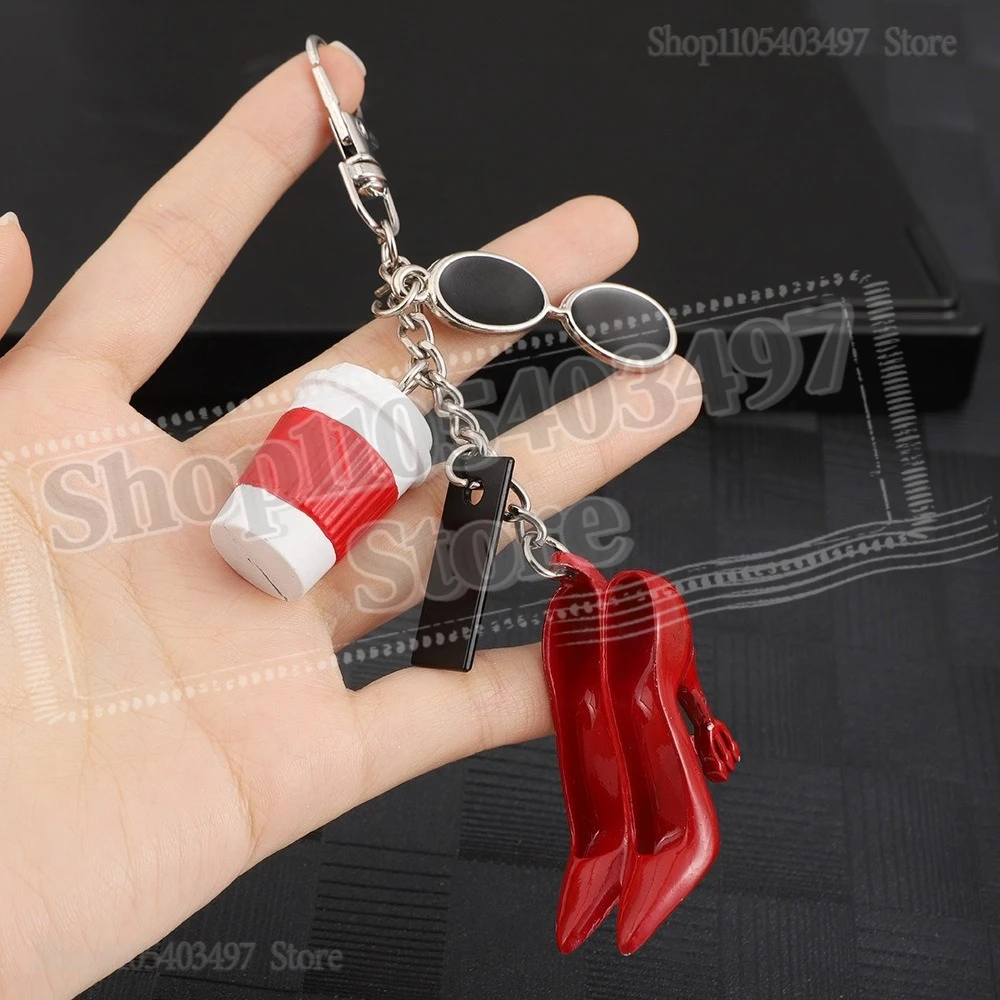The D-Wears-P2 Movie Keychain with Sunglasses Coffee Cup & High Heels Charms Bag Accessory for Fans
The D-Wears-P2 Movie Keychain with Sunglasses Coffee Cup & High Heels Charms Bag Accessory for Fans