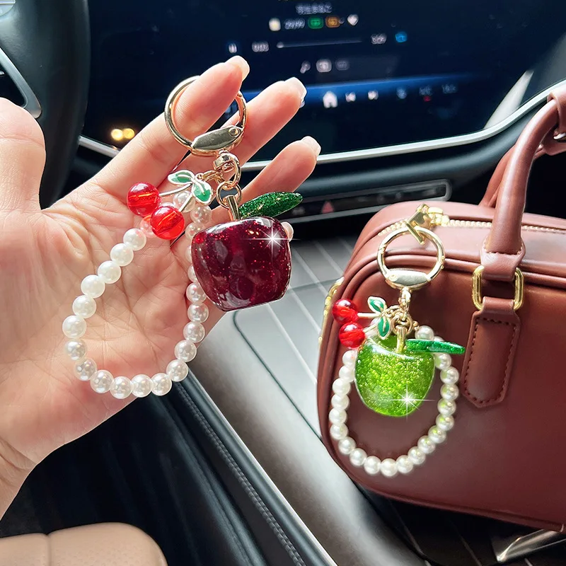 Glitter Resin Fruit Apple Bag Charm With Imitation Pearl Strand Heart Shaped Carabiner Keychain Cute Style Fruit Handbag Chain
Glitter Resin Fruit Apple Bag Charm With Imitation Pearl Strand Heart Shaped Carabiner Keychain Cute Style Fruit Handbag Chain