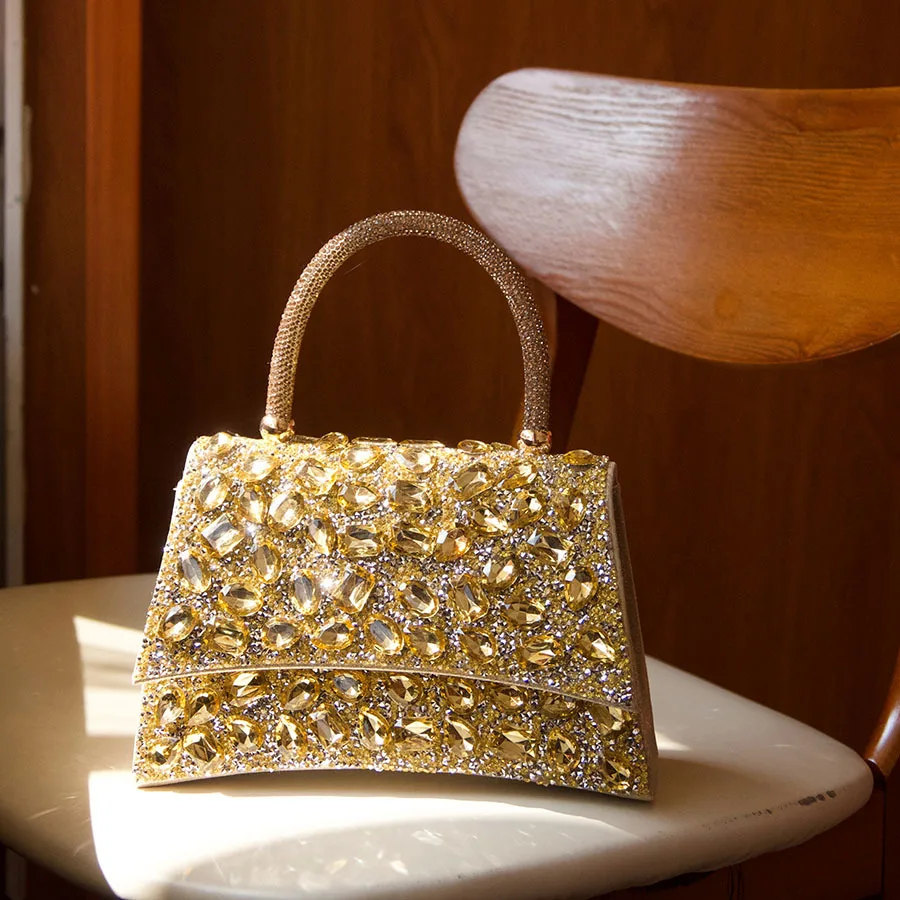 Full diamond light luxury portable dinner bag shining rhinestone exquisite design wedding bag versatile eye-catching handbag
Full diamond light luxury portable dinner bag shining rhinestone exquisite design wedding bag versatile eye-catching handbag