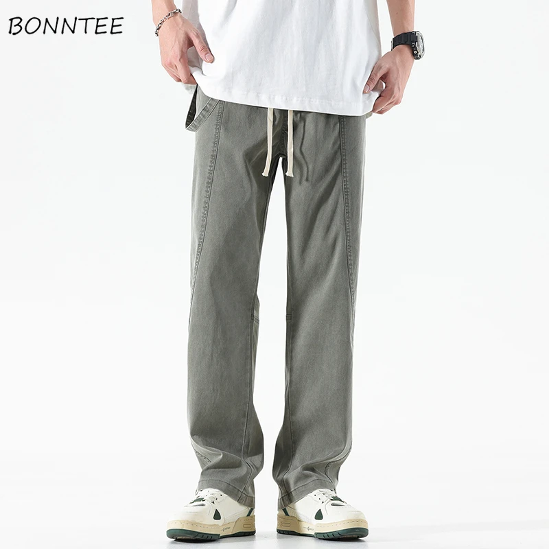Повседневные брюки в американском стиле для мужчин, свободные джоггеры, простые винтажные универсальные мягкие прямые брюки на шнурке, модные 
Повседневные брюки в американском стиле для мужчин, свободные джоггеры, простые винтажные универсальные мягкие прямые брюки на шнурке, модные