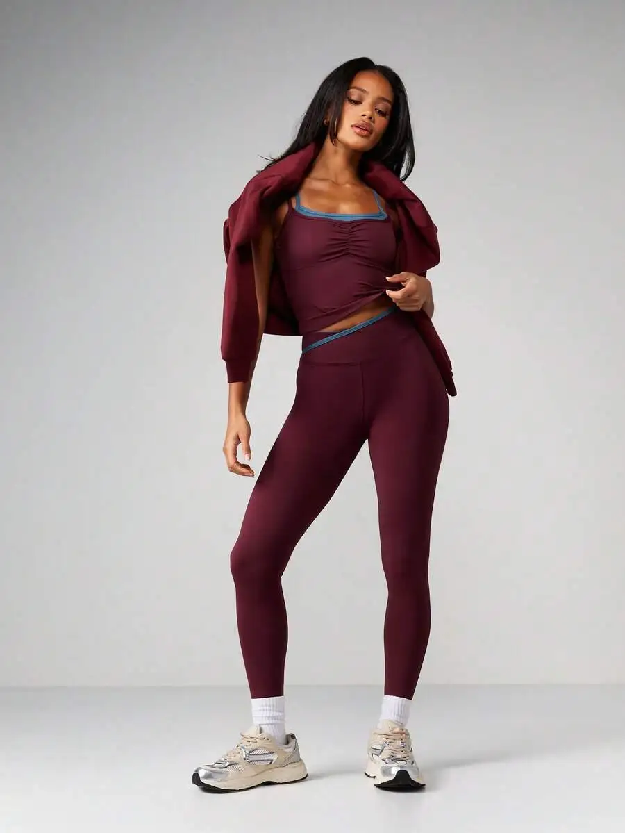 Burgundy Ruched Crop Tank Top And High Waisted Leggings Set With Blue Trim Athletic Co Ord
Burgundy Ruched Crop Tank Top And High Waisted Leggings Set With Blue Trim Athletic Co Ord