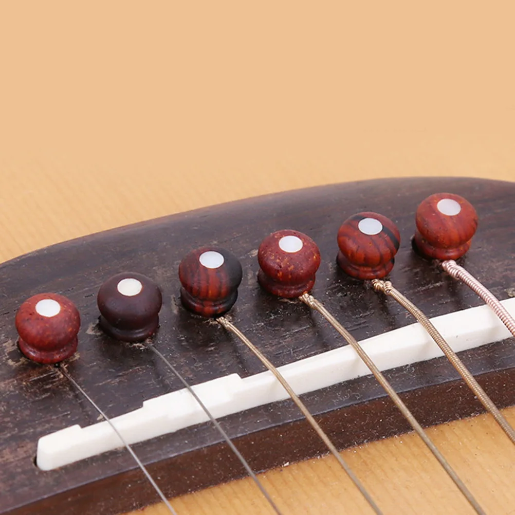 7 Pcs Guitar String Nails Bridge Replacement Pins Pegs Shell Cocoa Pineapple Extractor
7 Pcs Guitar String Nails Bridge Replacement Pins Pegs Shell Cocoa Pineapple Extractor